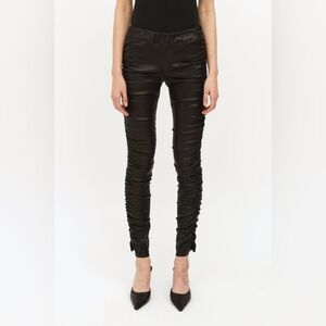The Row black Orshen touched leather leggings